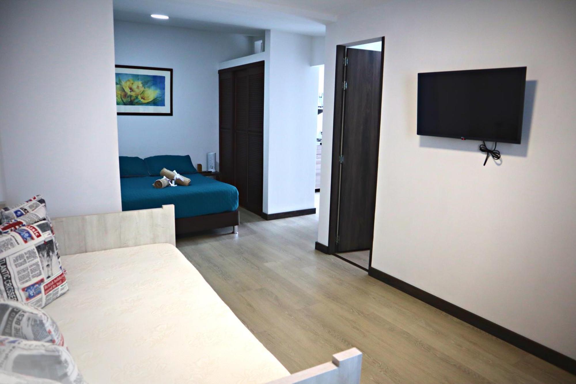 Apartahotel La Arboleda Hc มานิซาเลส ภายนอก รูปภาพ